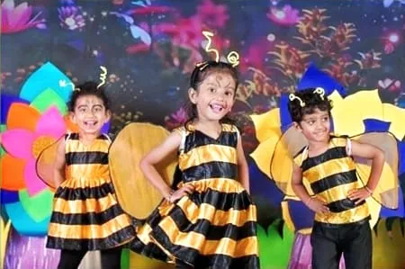 Children dressed as bees at the annual day