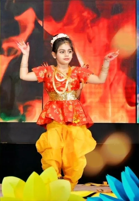 A child performing a classical dance